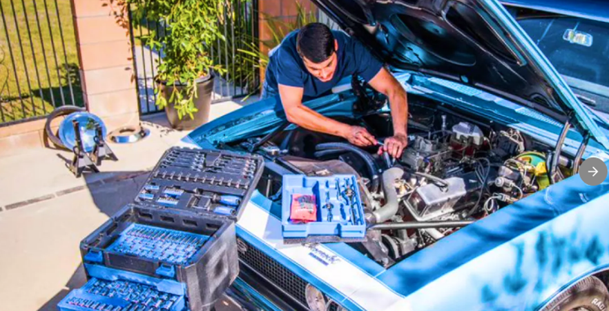 Photo of DIYer working on his car using Kobalt tools.
