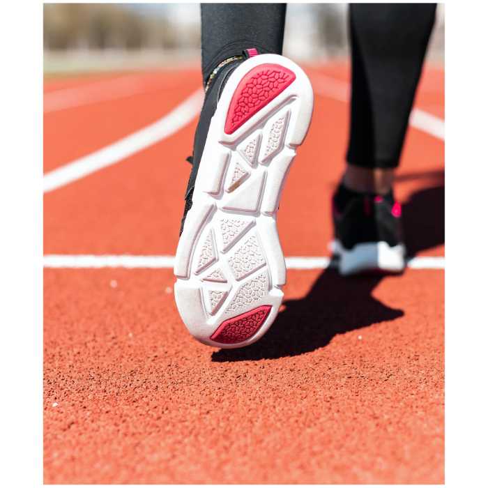 Woman on the track with a great running shoe