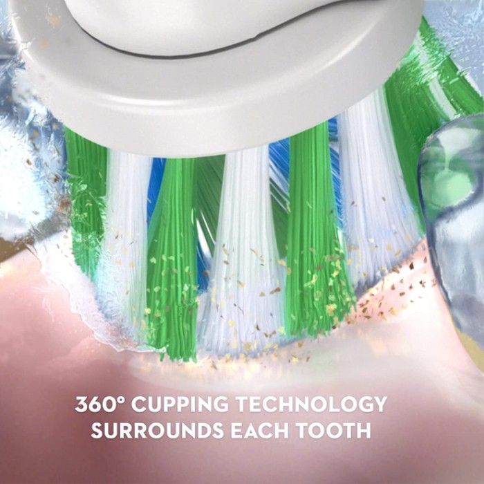 Image of rotating brush head cleaning teeth