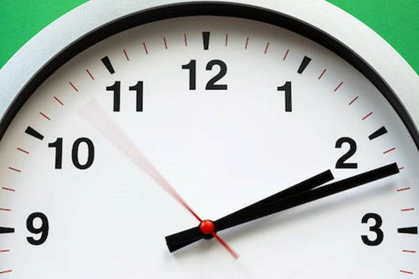 Photo of a clock use to time intermittent fasting intervals.