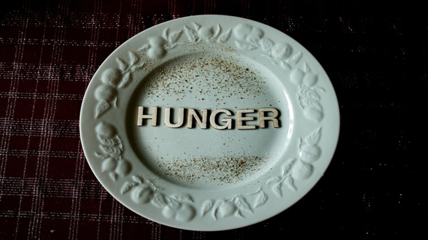 Image to describe hunger as a side effect of intermittent fasting.