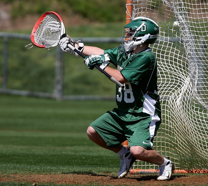 Photo of Lacrosse Goalie making a save